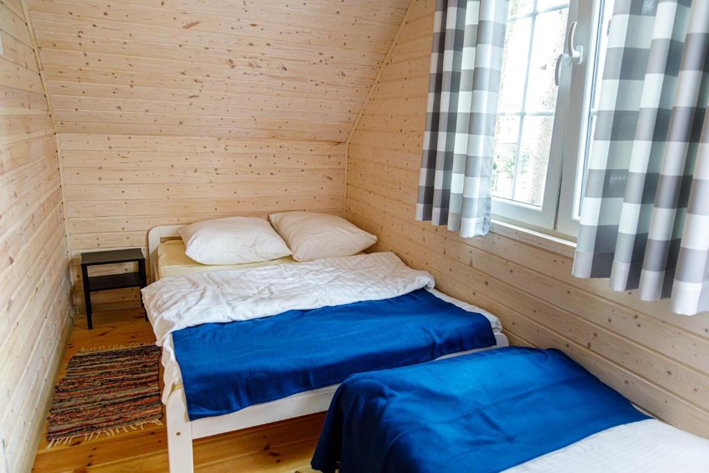 Postel nebo postele na pokoji v ubytování Pinia