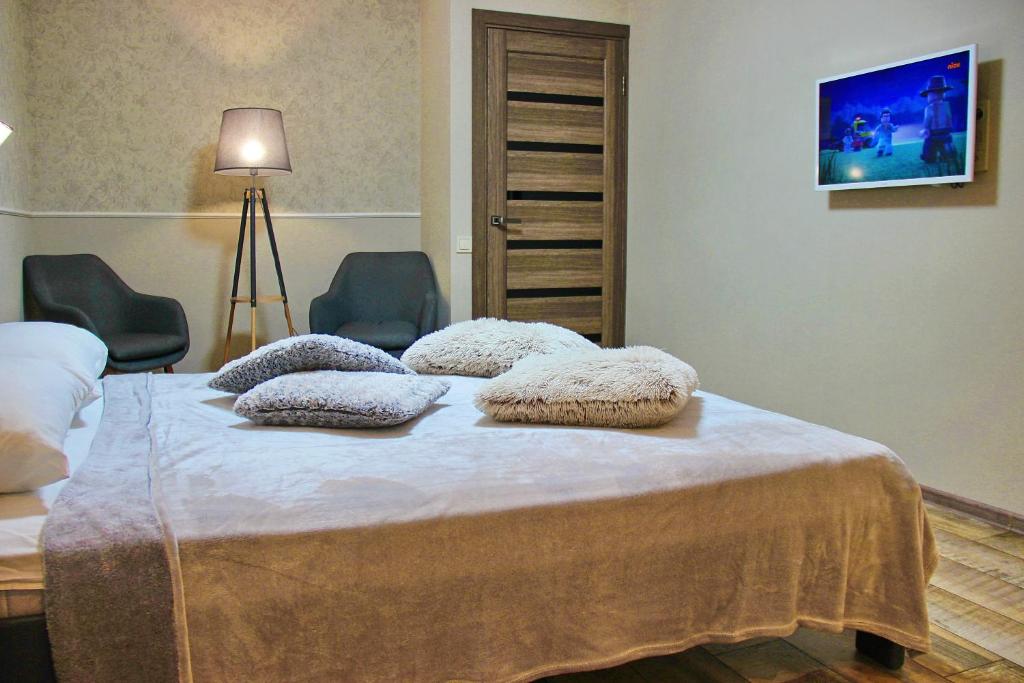 Postel nebo postele na pokoji v ubytování Molex Apartments 3