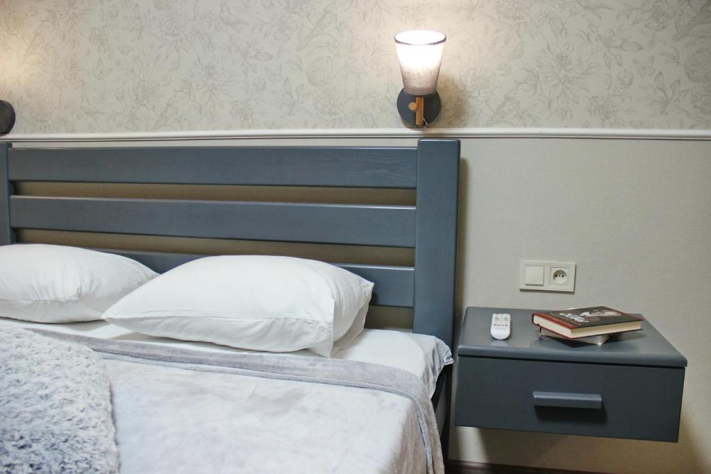Postel nebo postele na pokoji v ubytování Molex Apartments 3