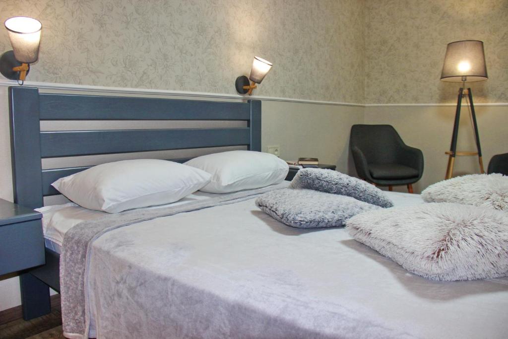 Postel nebo postele na pokoji v ubytování Molex Apartments 3