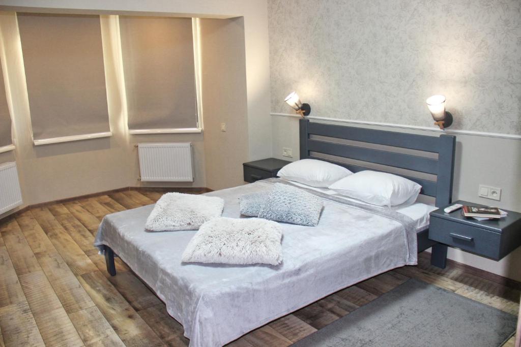 Postel nebo postele na pokoji v ubytování Molex Apartments 3