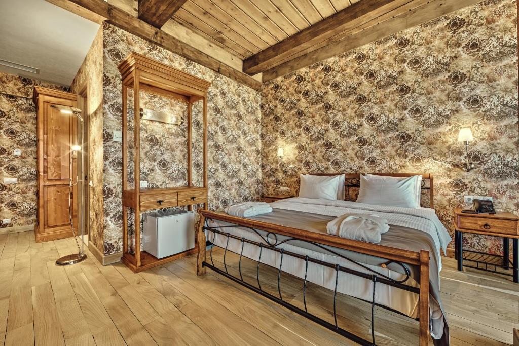 Postel nebo postele na pokoji v ubytování Ampelo Resort