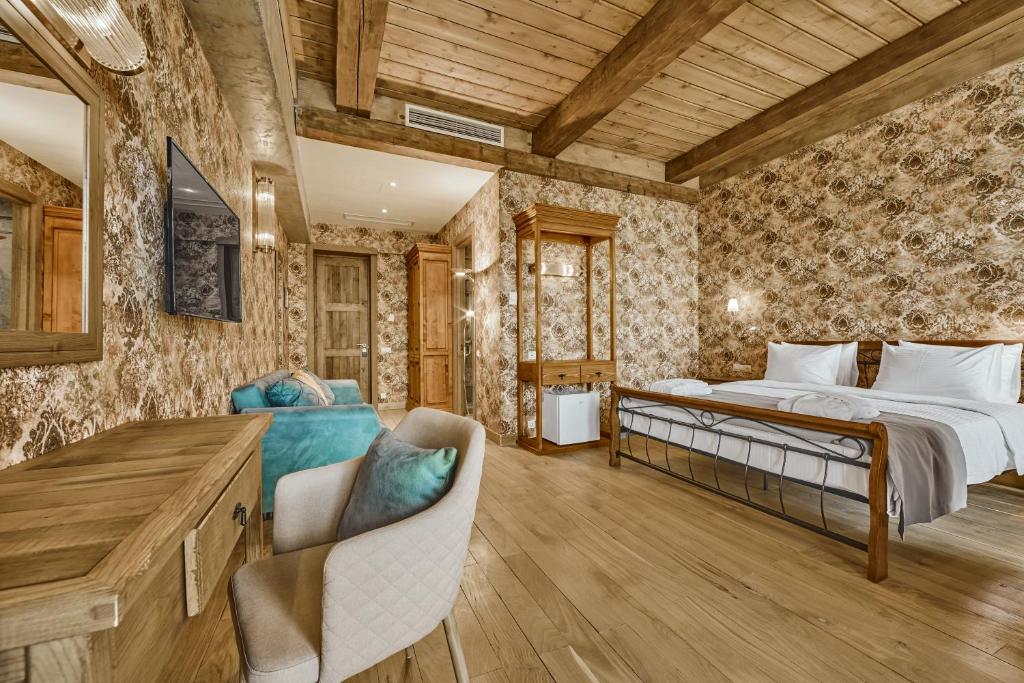 Postel nebo postele na pokoji v ubytování Ampelo Resort