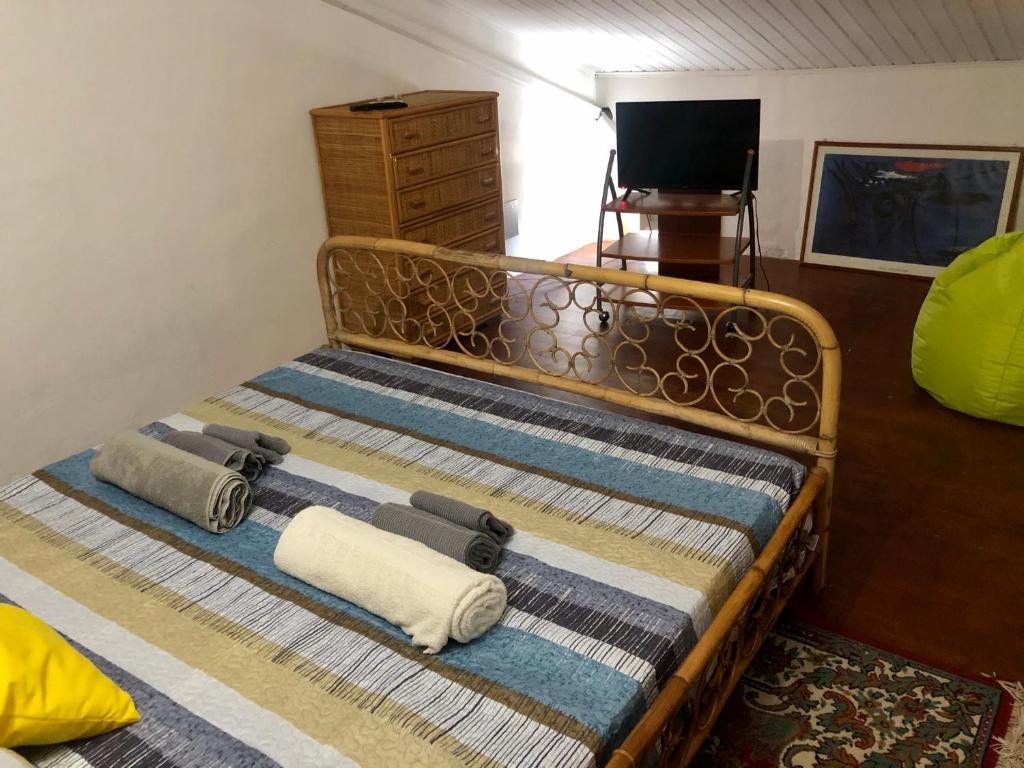 Posteľ alebo postele v izbe v ubytovaní Casa Sikania