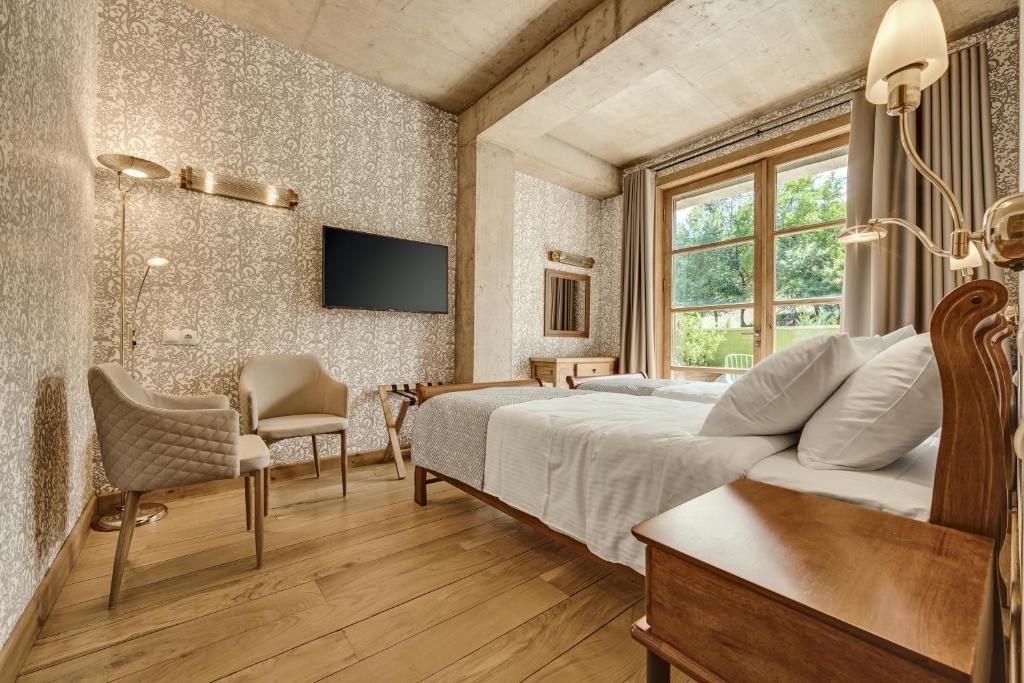 TV a/nebo společenská místnost v ubytování Ampelo Resort