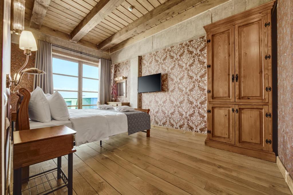 TV a/nebo společenská místnost v ubytování Ampelo Resort