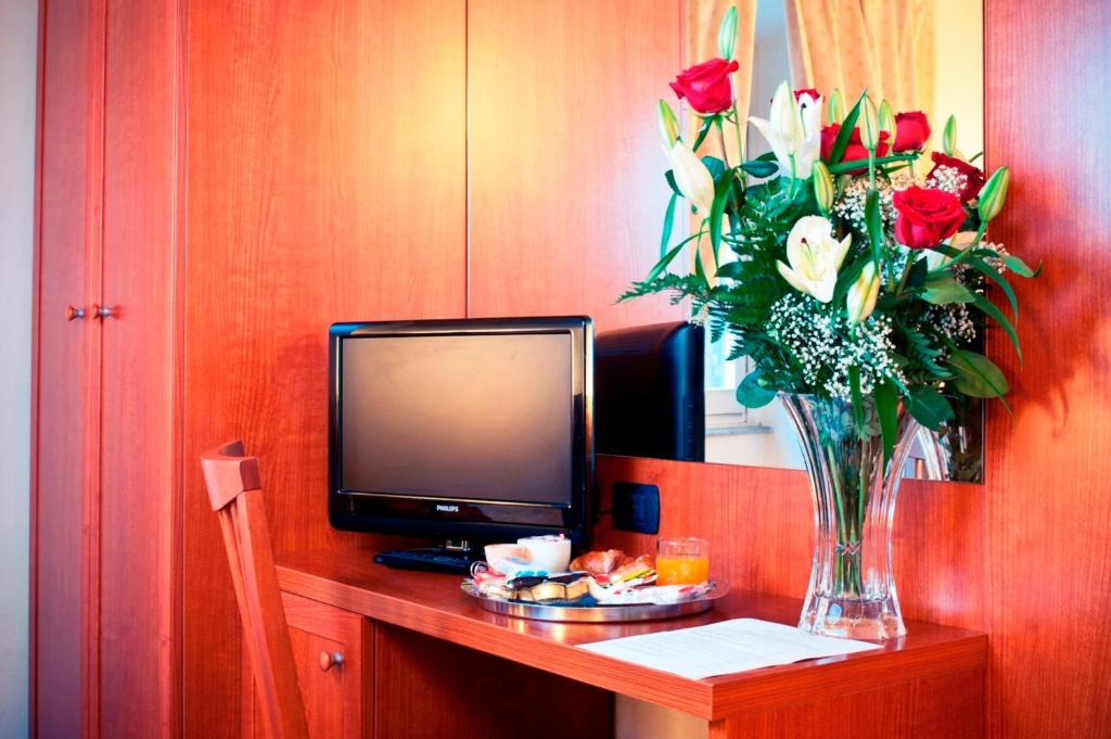 TV a/nebo společenská místnost v ubytování Hotel Priscilla