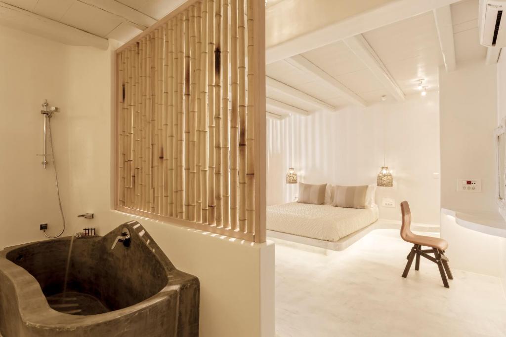 Posteľ alebo postele v izbe v ubytovaní Naxian Collection - Small Luxury Hotel of the World