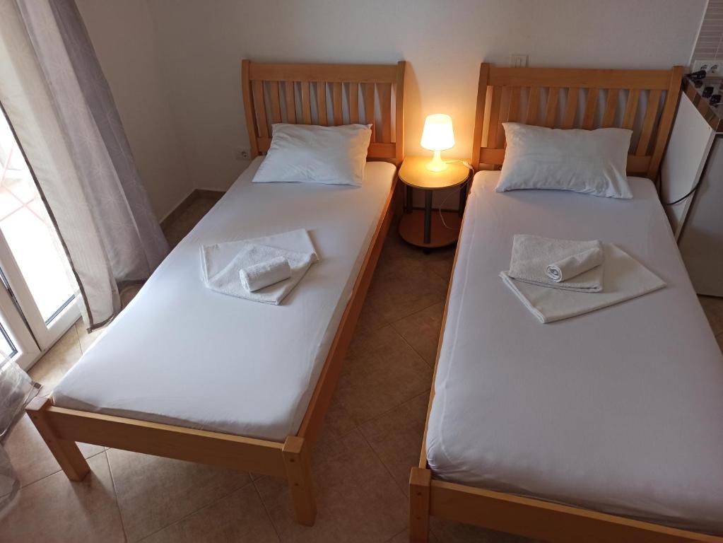 Postel nebo postele na pokoji v ubytování Apartment's Meti