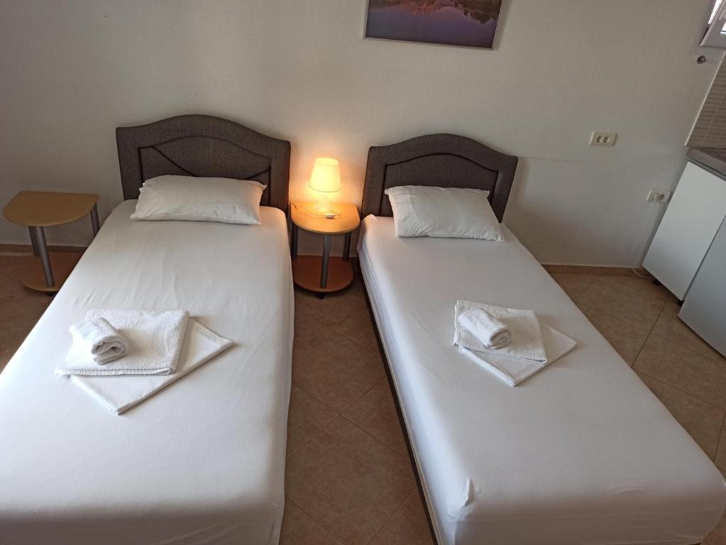 Postel nebo postele na pokoji v ubytování Apartment's Meti