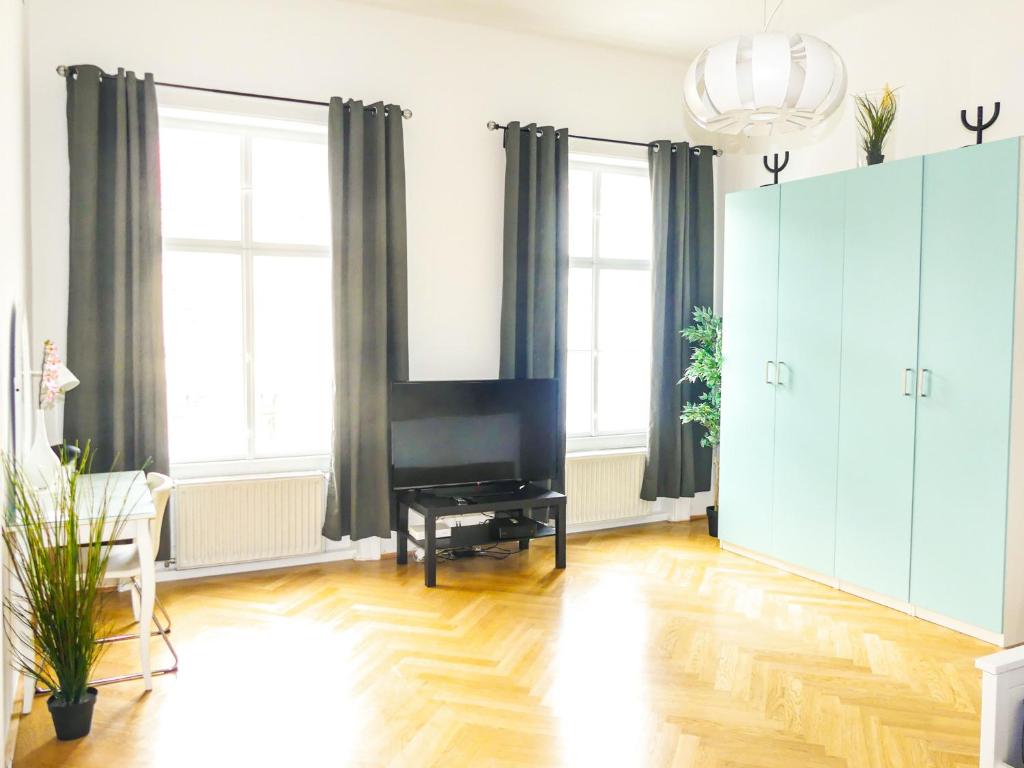 Telewizja i/lub zestaw kina domowego w obiekcie Vienna Hotspot