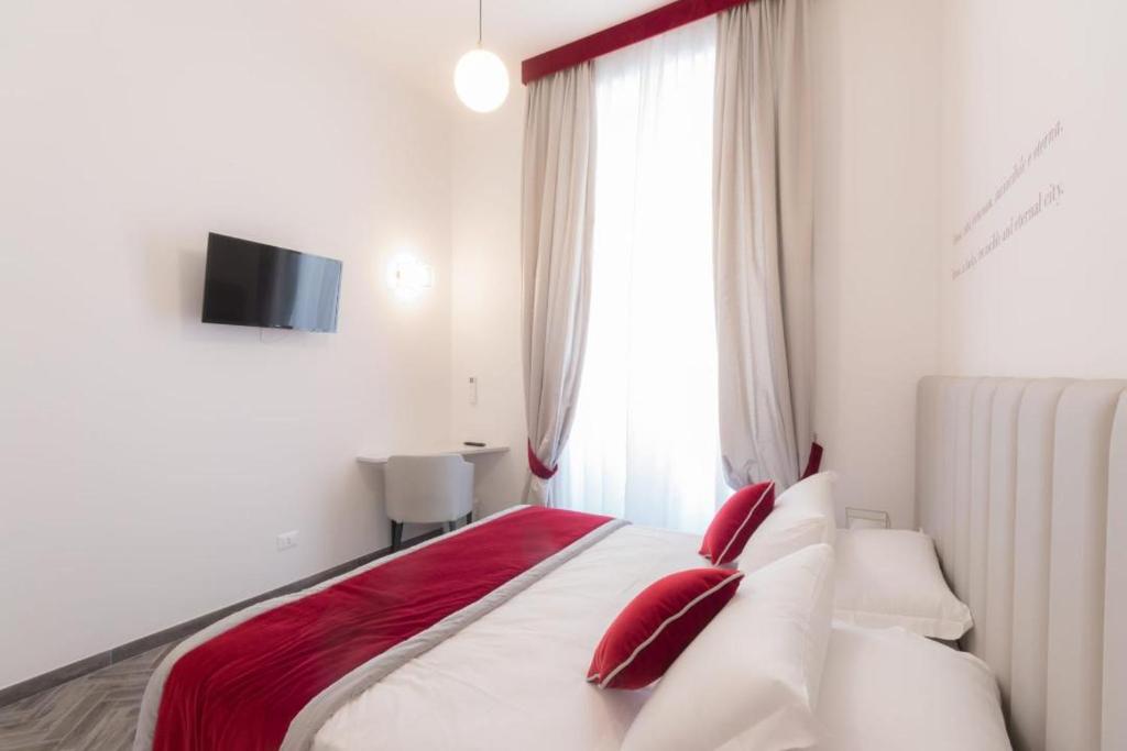 Televízia a/alebo spoločenská miestnosť v ubytovaní Frattina FF italian suites