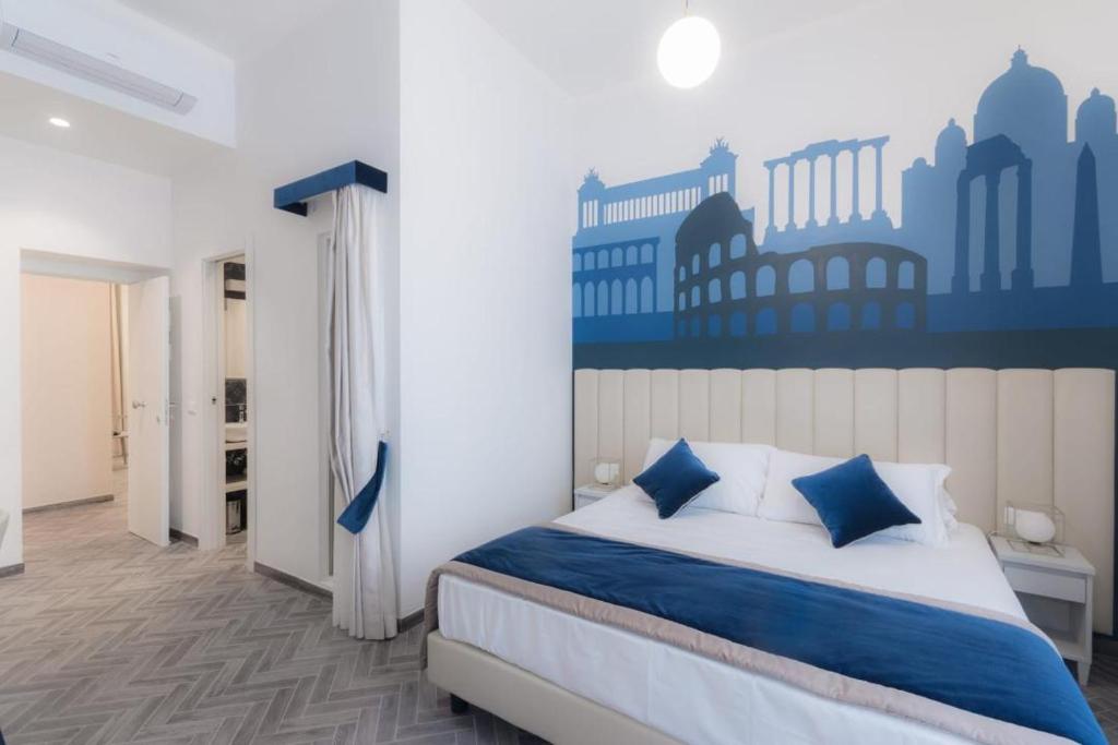 Posteľ alebo postele v izbe v ubytovaní Frattina FF italian suites