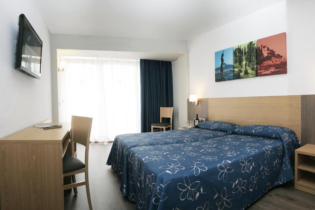 Postel nebo postele na pokoji v ubytování Hotel Acapulco