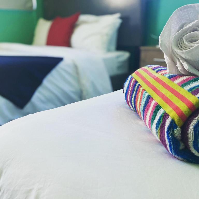 Una cama o camas en una habitación de Conturce Hostel