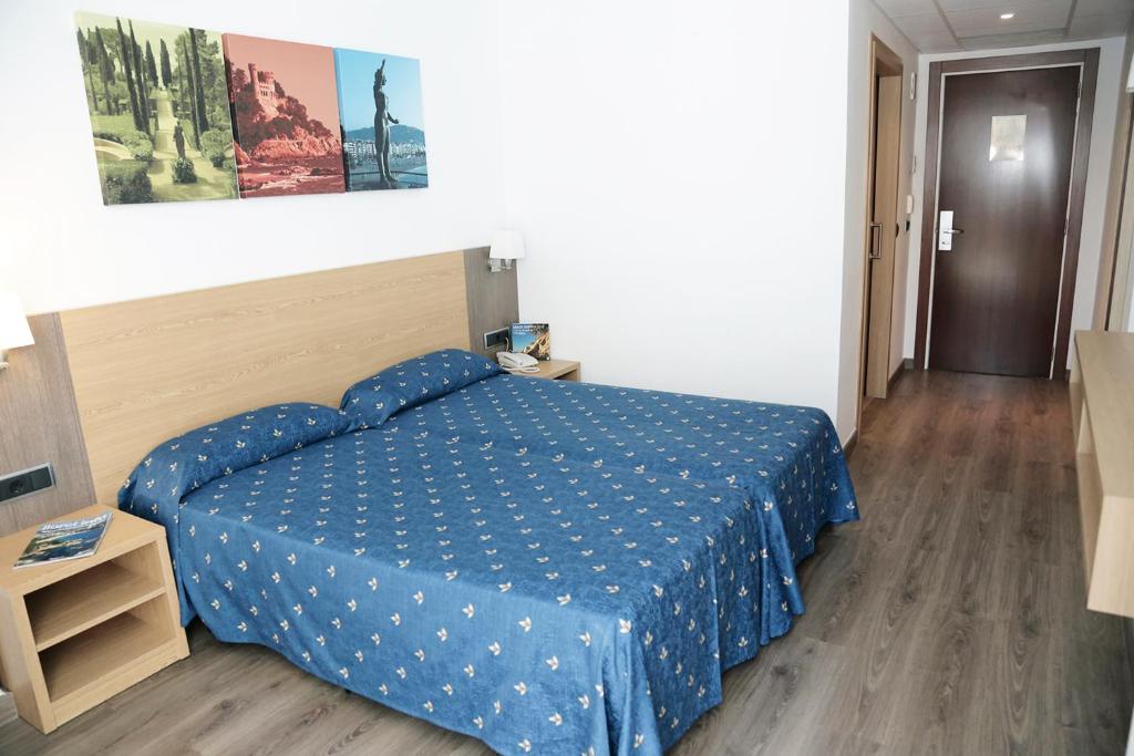 Postel nebo postele na pokoji v ubytování Hotel Acapulco