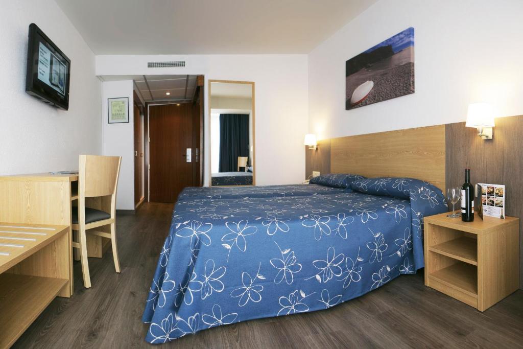 Postel nebo postele na pokoji v ubytování Hotel Acapulco