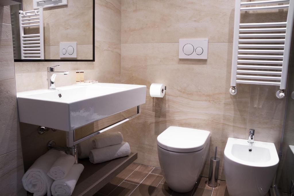 Koupelna v ubytování Litoraneo Suite Hotel