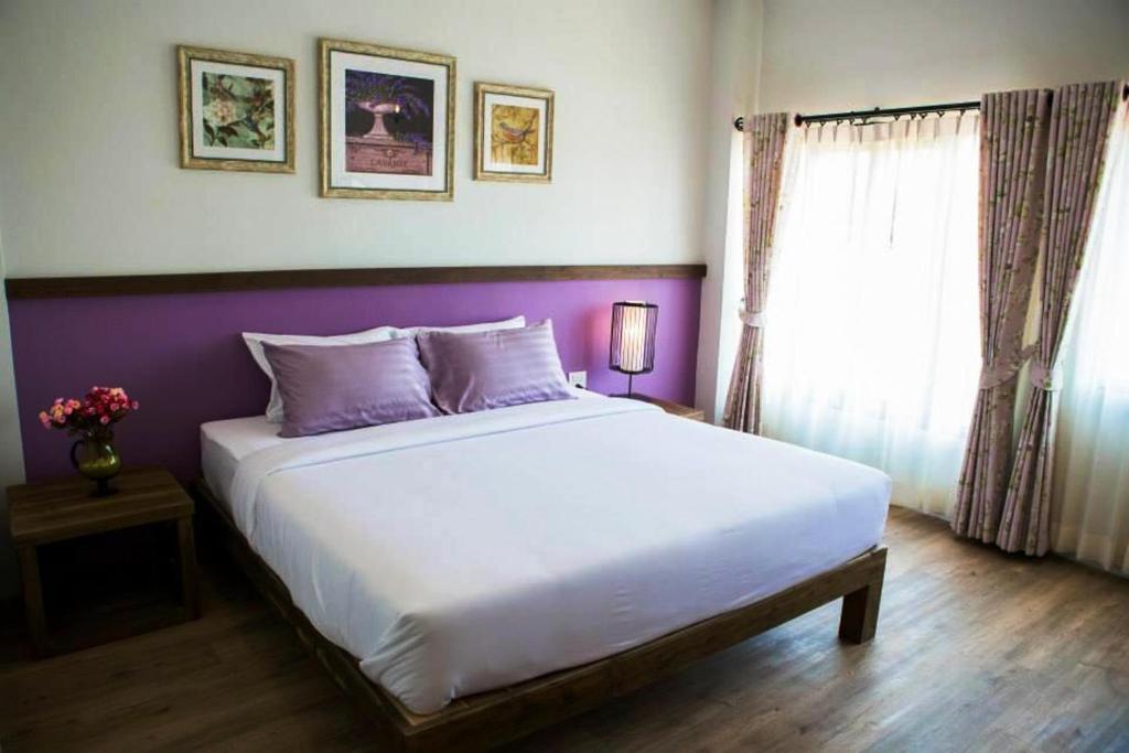 Postel nebo postele na pokoji v ubytování Hotel Toscana Trat