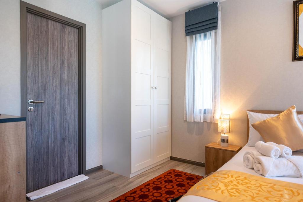 Postel nebo postele na pokoji v ubytování The Apartment at The Title Residencies Naiyang Beach