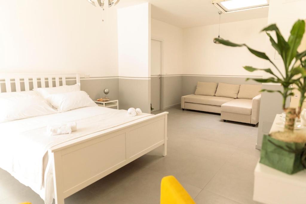 Posteľ alebo postele v izbe v ubytovaní B&B LA CUPOLA