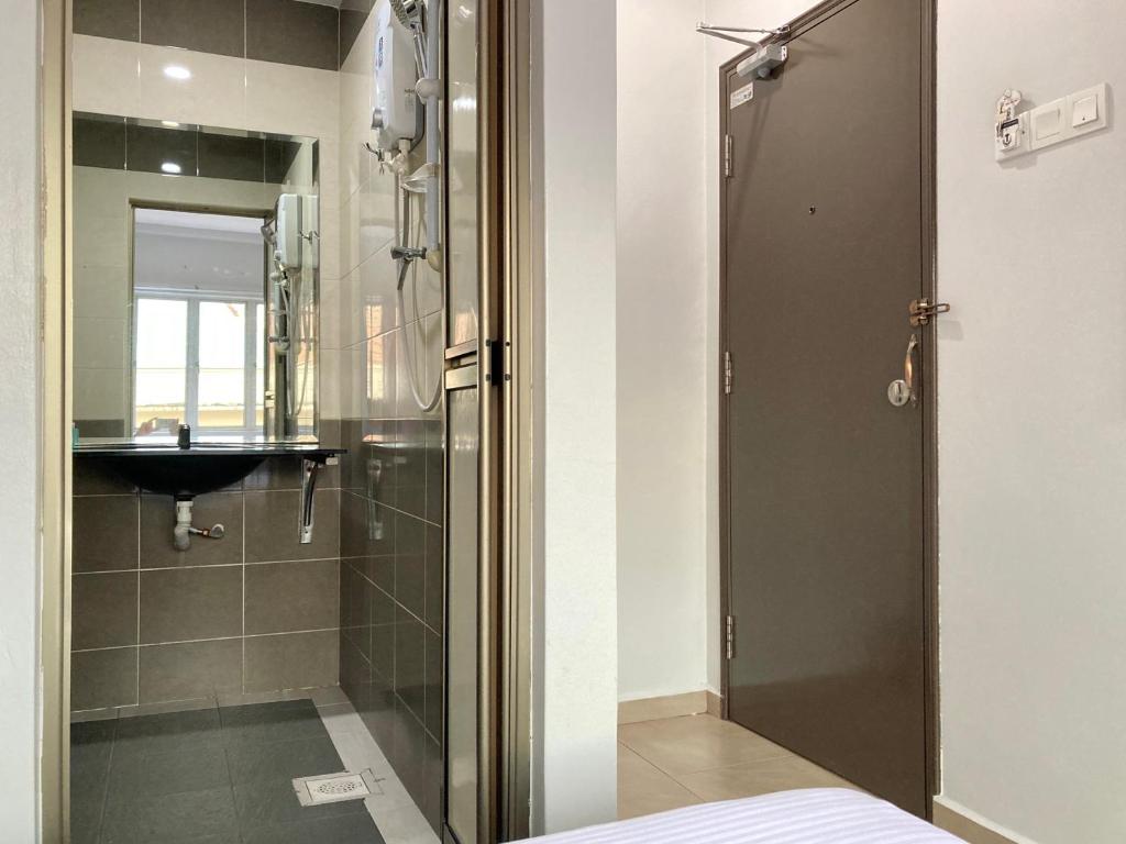 Koupelna v ubytování CK Hotel