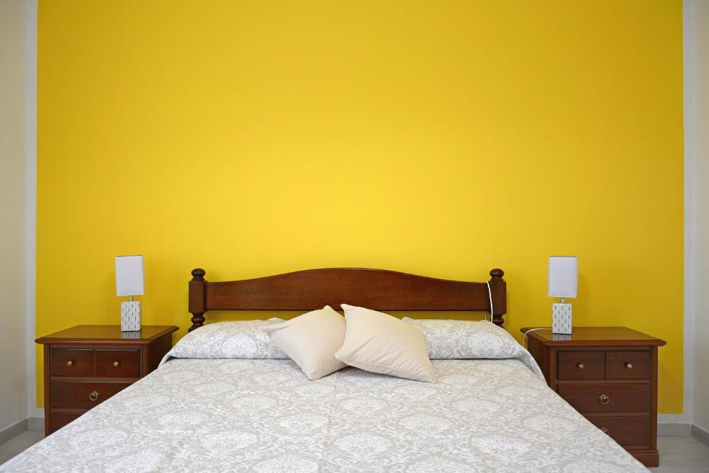 Łóżko lub łóżka w pokoju w obiekcie Agriturismo La Casa degli Zii