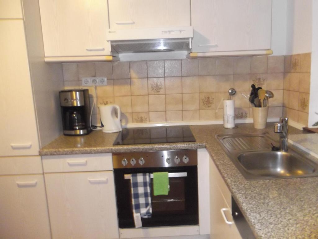 Kuchyň nebo kuchyňský kout v ubytování Ferienwohnung Feist