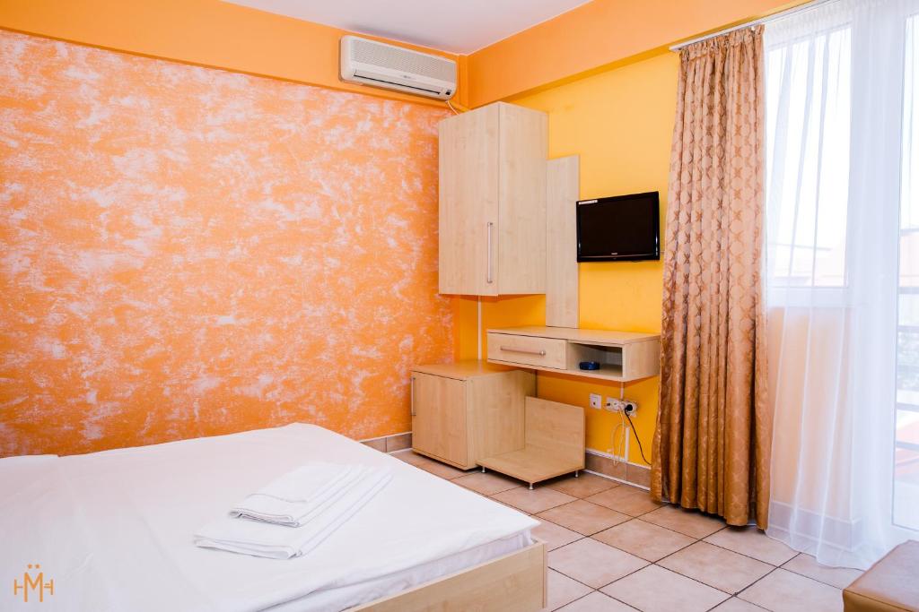 Postel nebo postele na pokoji v ubytování Meridian Costinești