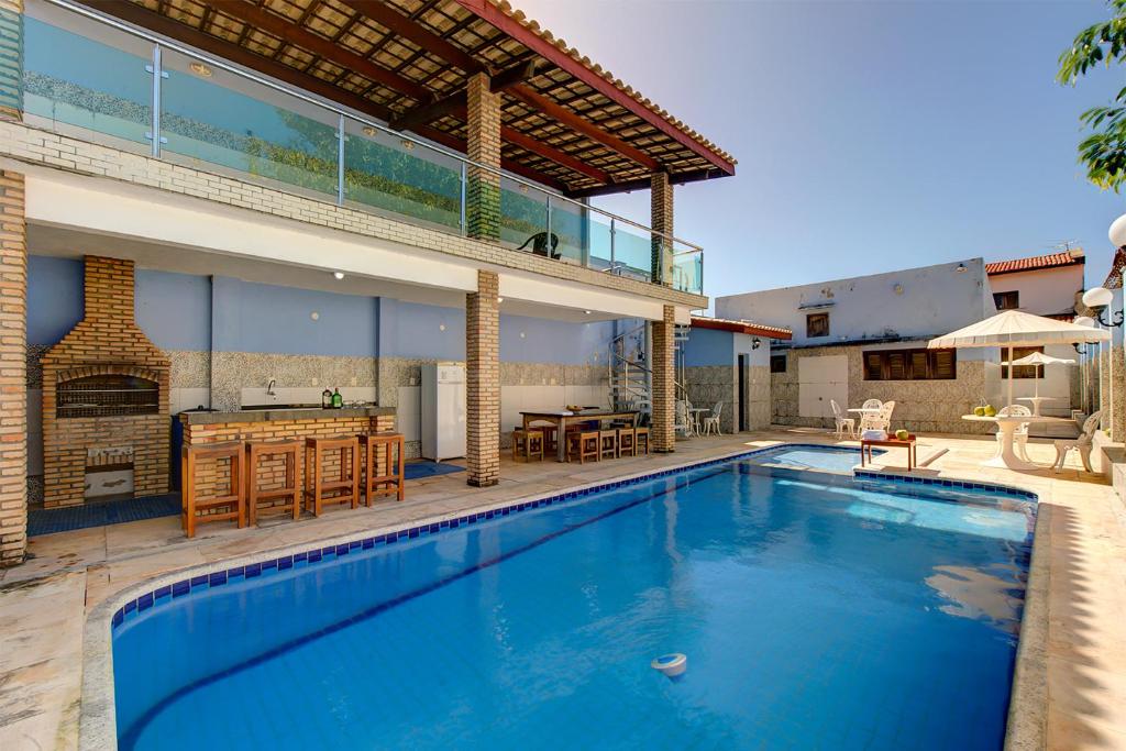  Charmosa casa vista lago e com piscina na praia do Iguape por Carpediem