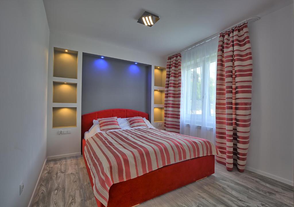 Postel nebo postele na pokoji v ubytování Jaworina- Apartamenty, Domki i Pokoje