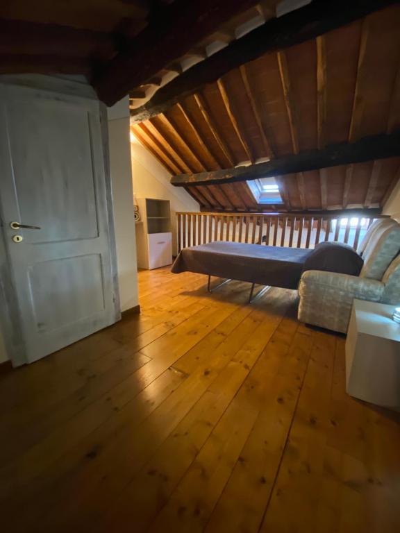 Łóżko lub łóżka w pokoju w obiekcie Le Casette nel Borgo