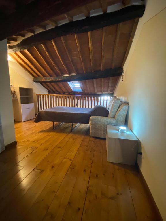 Łóżko lub łóżka w pokoju w obiekcie Le Casette nel Borgo