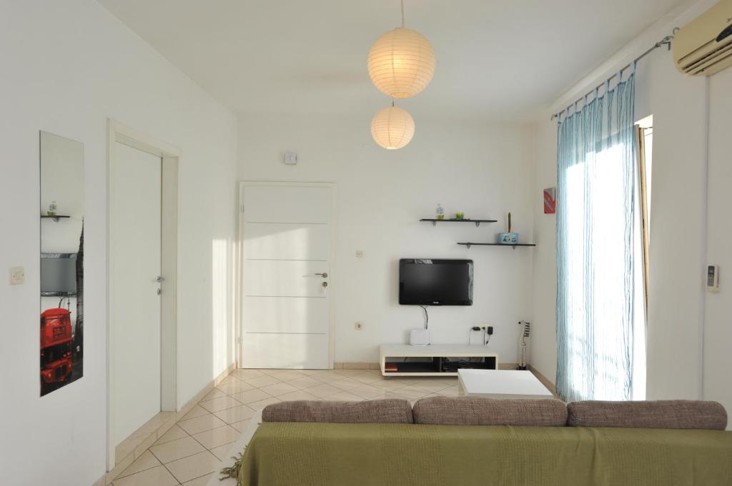 TV a/nebo společenská místnost v ubytování Apartments Pepi