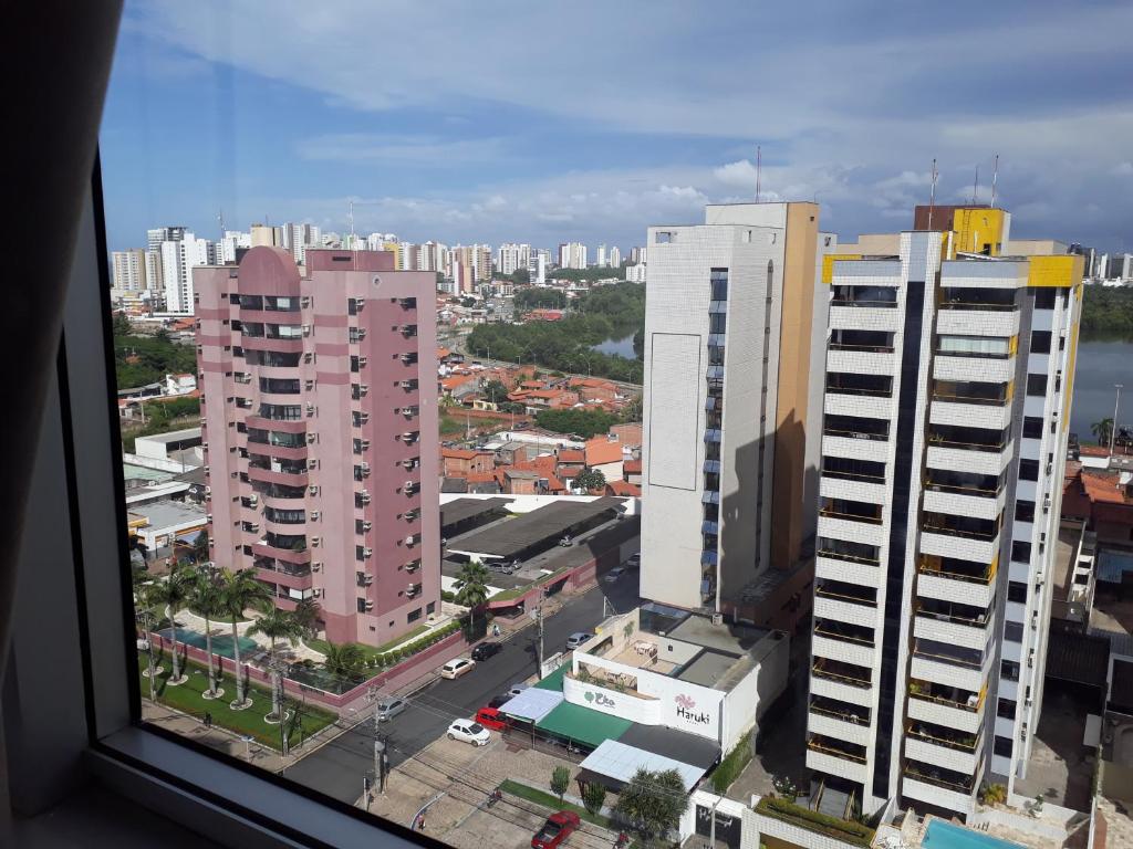 a view from a window of a city with tall buildings at Silva Hospedagem in São Luís