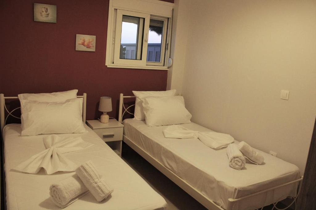 Postel nebo postele na pokoji v ubytování Bilines Home