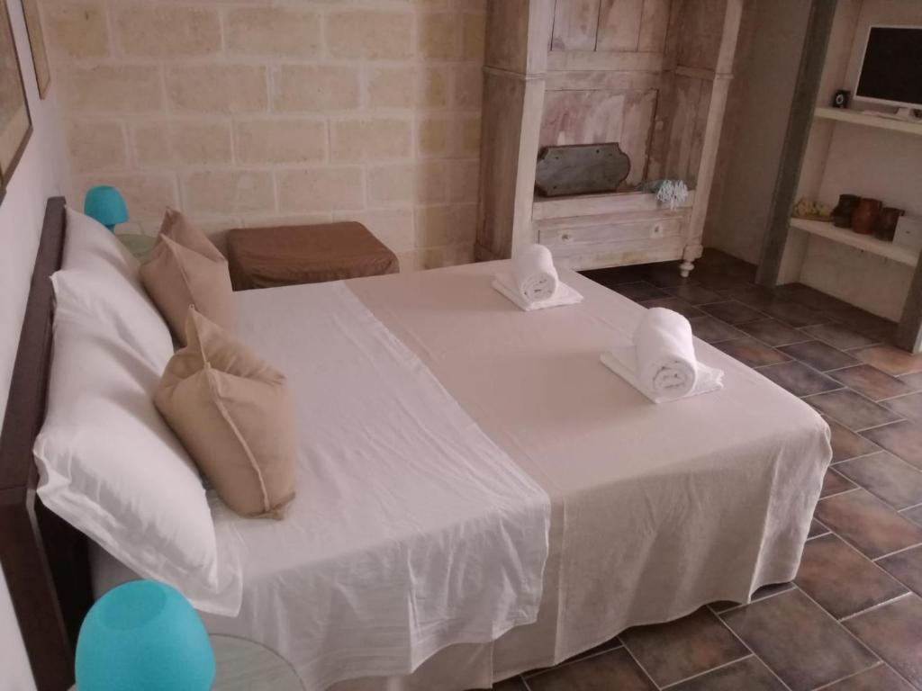 Posteľ alebo postele v izbe v ubytovaní Le Biadelle - Country Boutique Apartments - Villa Laura Ostuni