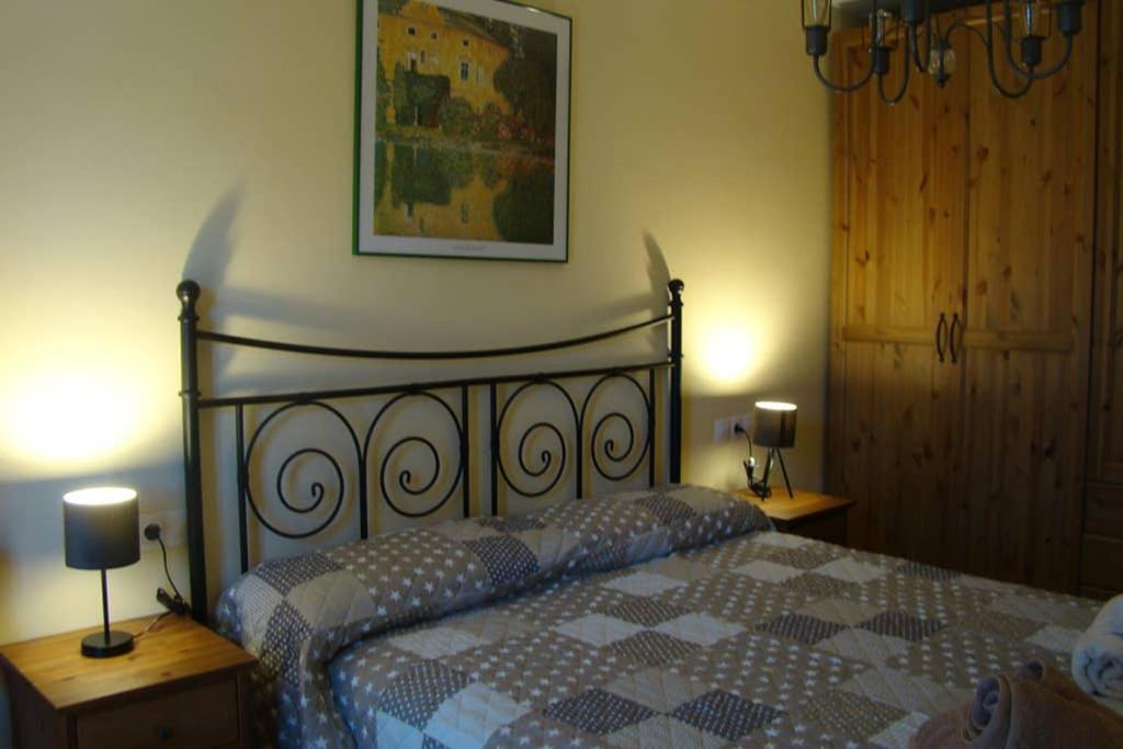 Postel nebo postele na pokoji v ubytování El Capricho de Bego