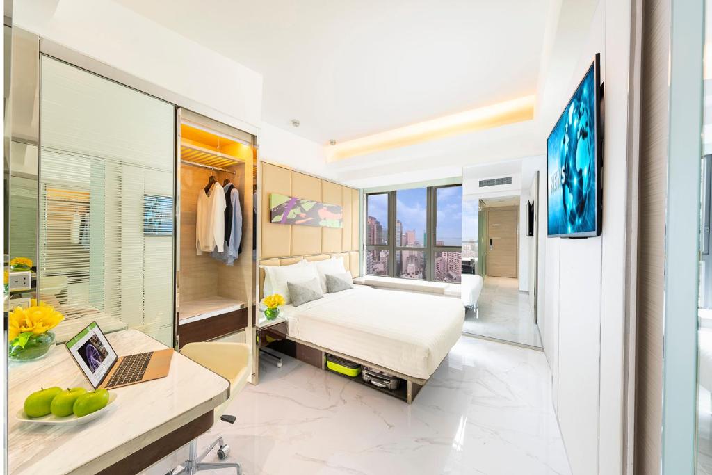Letto o letti in una camera di iclub AMTD Sheung Wan Hotel