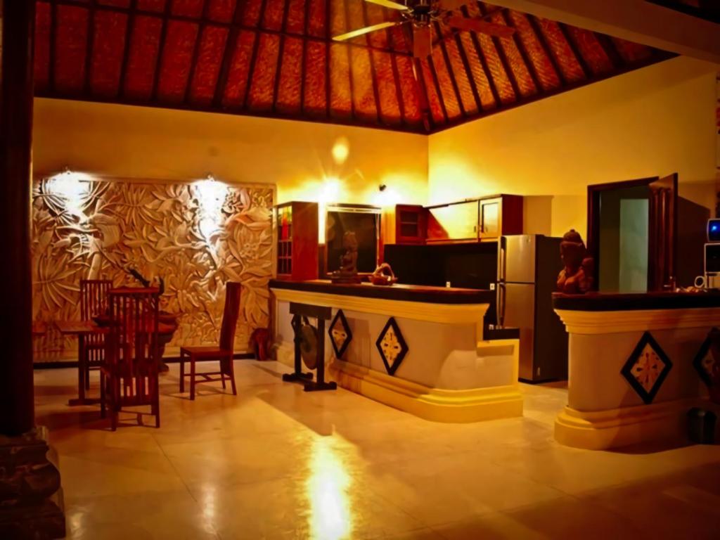 Una cocina o cocineta en Junjungan Suite