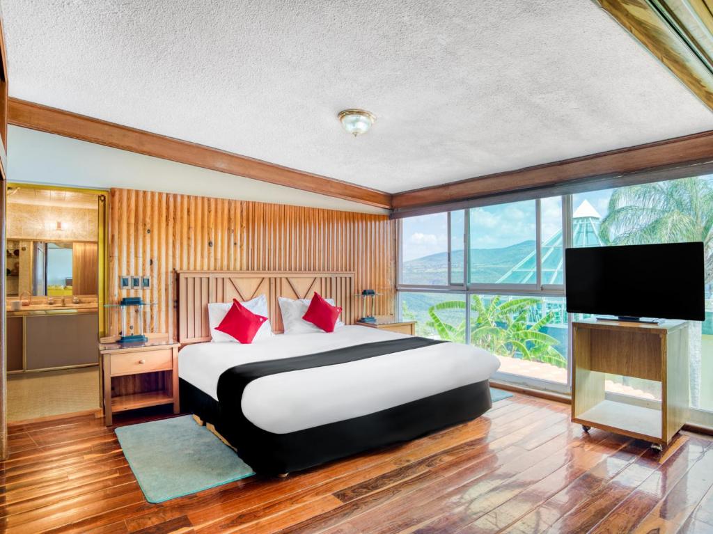 Postel nebo postele na pokoji v ubytování Hotel y Spa Posada Mirador