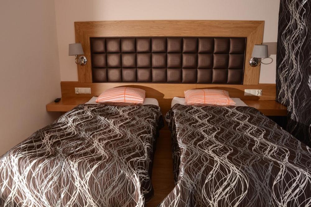 Cama o camas de una habitación en Dolina Pilicy