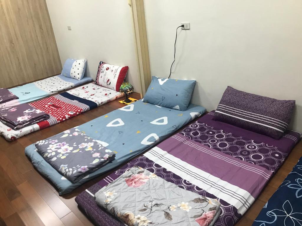 Postel nebo postele na pokoji v ubytování 枋寮枋居背包客棧Fang Ju Backpackers