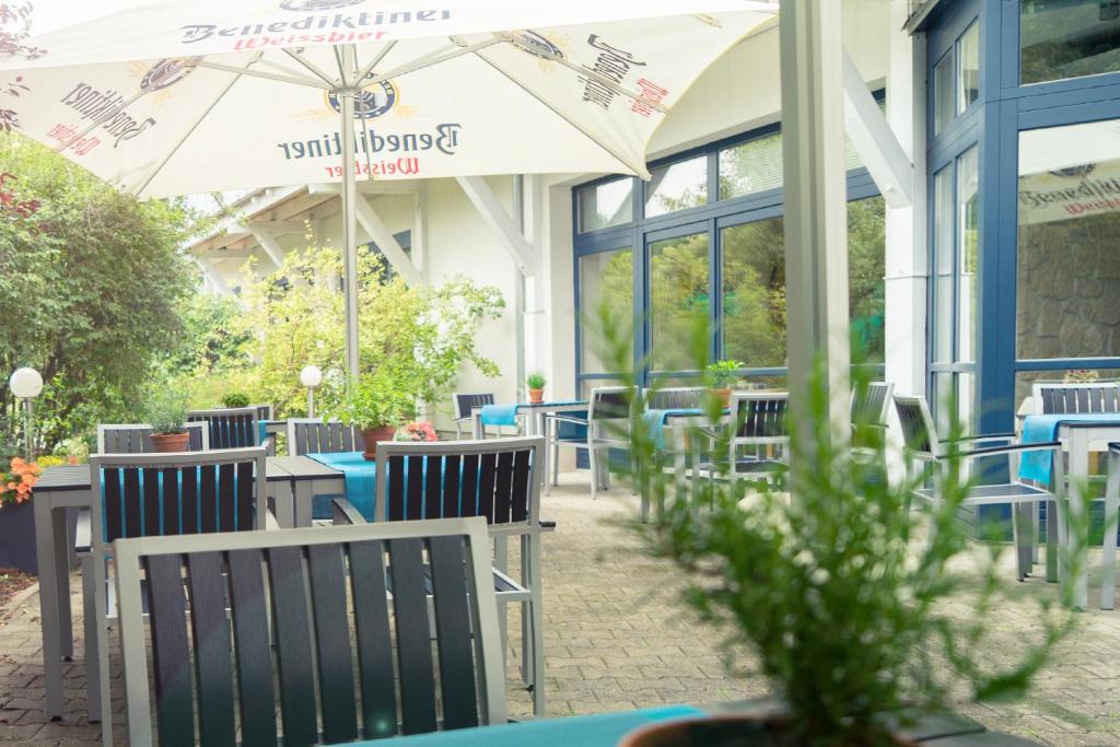 Een restaurant of ander eetgelegenheid bij aktiv Sporthotel Sächsische Schweiz