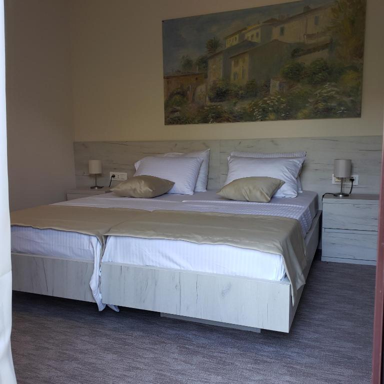 Postel nebo postele na pokoji v ubytování Hotel RIO VERDE