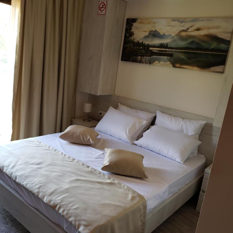 Postel nebo postele na pokoji v ubytování Hotel RIO VERDE