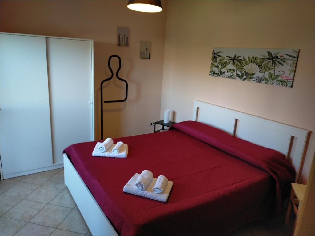 Postel nebo postele na pokoji v ubytování Apartment Michelangelo