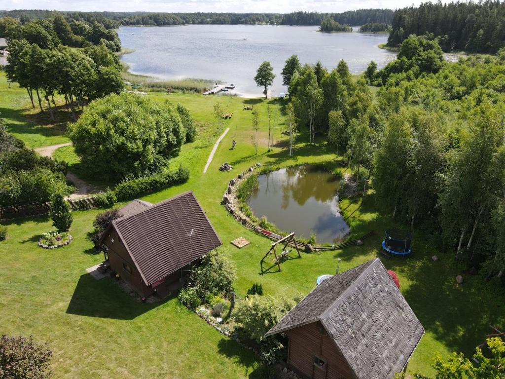 an aerial view of a house and a lake at Beržoro pakrantė in Berżory