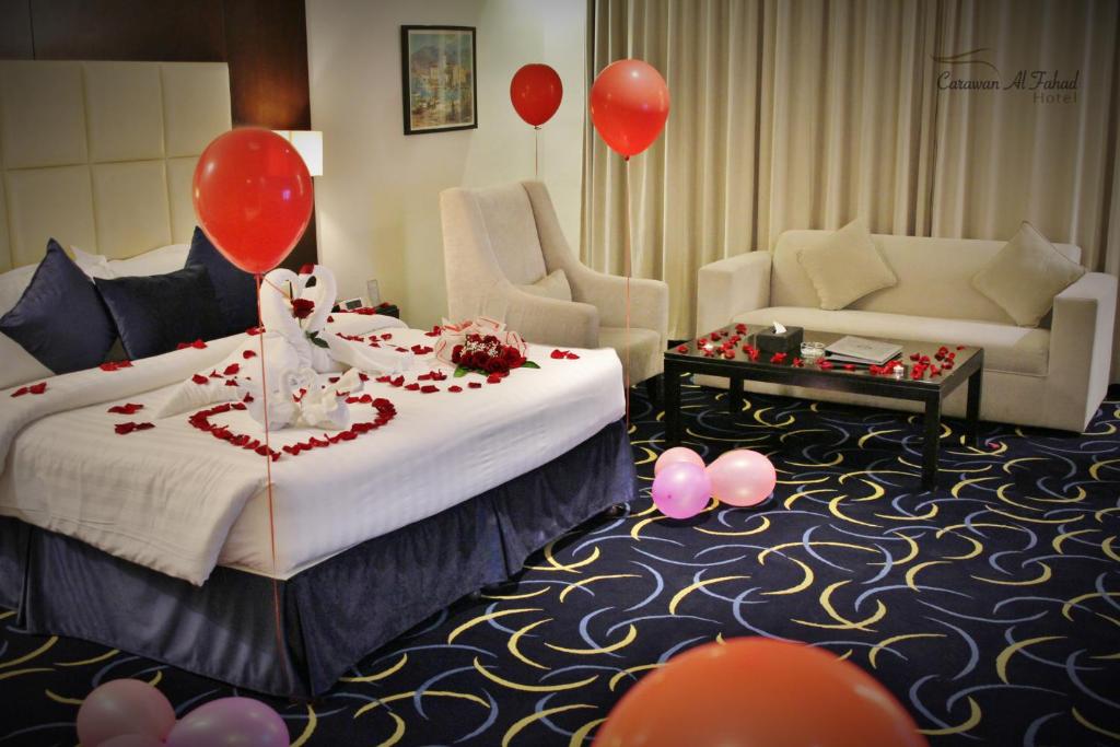 Postel nebo postele na pokoji v ubytování Carawan Al Fahad Hotel
