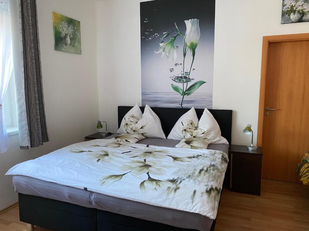 Postel nebo postele na pokoji v ubytování Apartman c.8 Magnolie